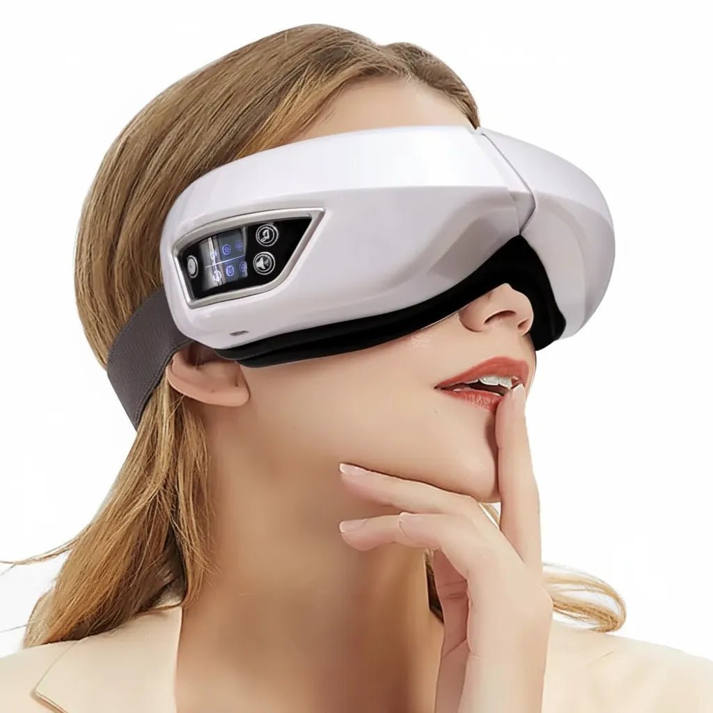 Femme utilisant le masseur oculaire 6D Bluetooth IceRelief blanc pour relaxation et soulagement de la fatigue